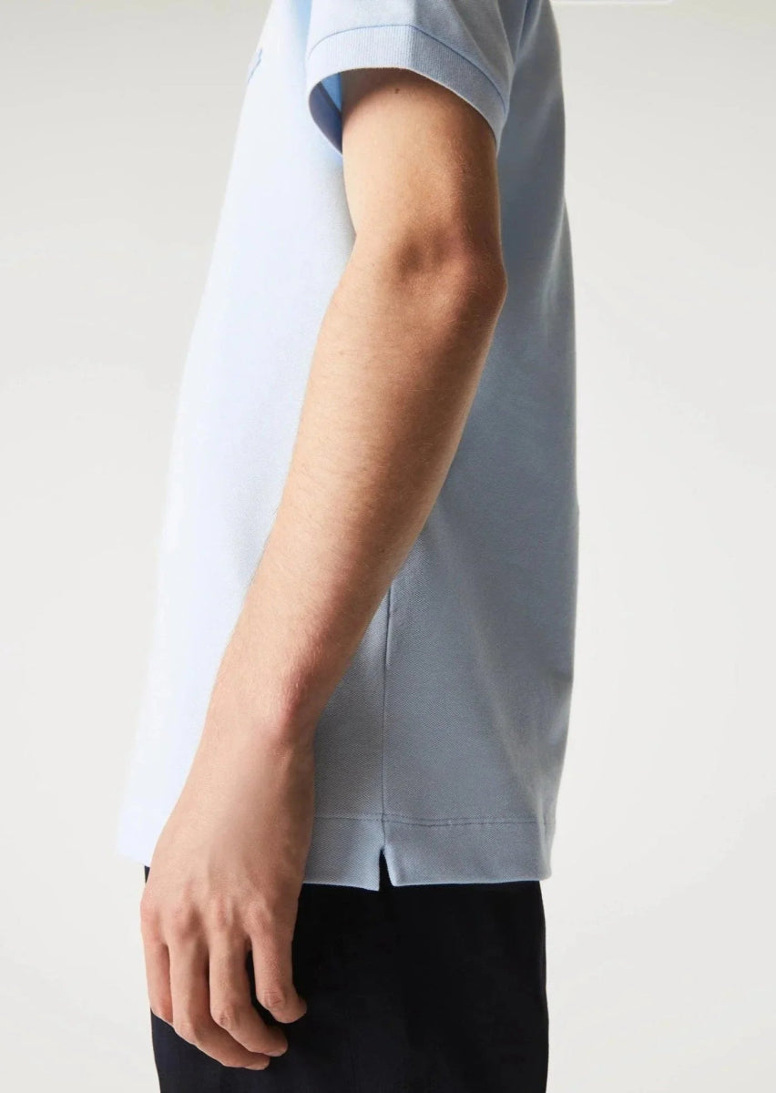 Polo Paris Lacoste bleu clair - French Destock